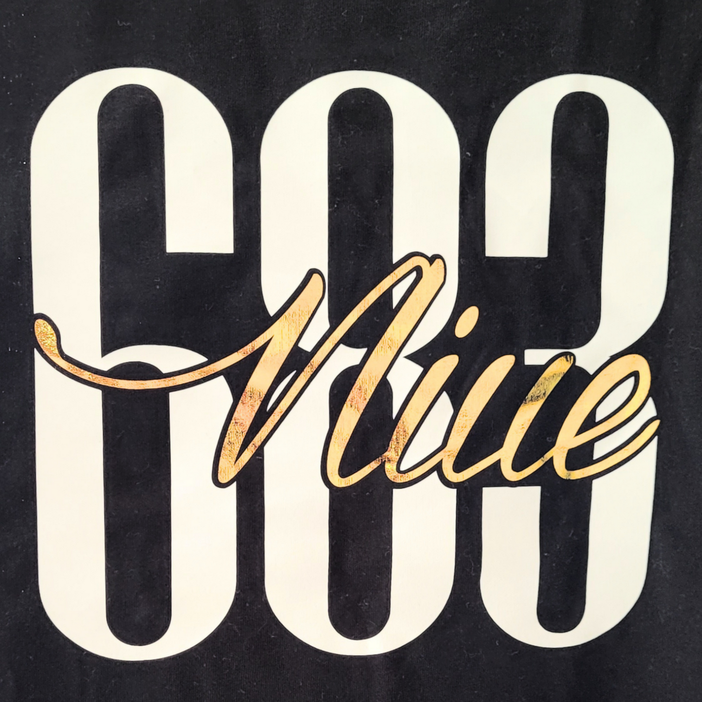 Niue 683 t-shirt. Style Black - with white vinyl numbers 683. with holographic word Niue striking through it. perfect for everyday wear.