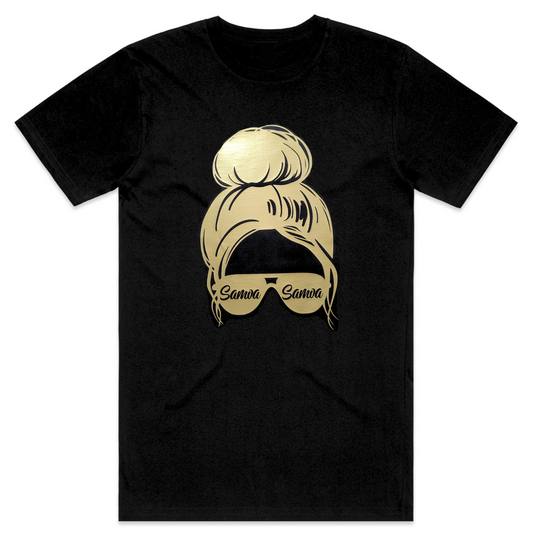 A black t-shirt featuring a gold silhouette image of a messy bun hairstyle with sunglasses. The word "Samoa" is written on the sunglasses.